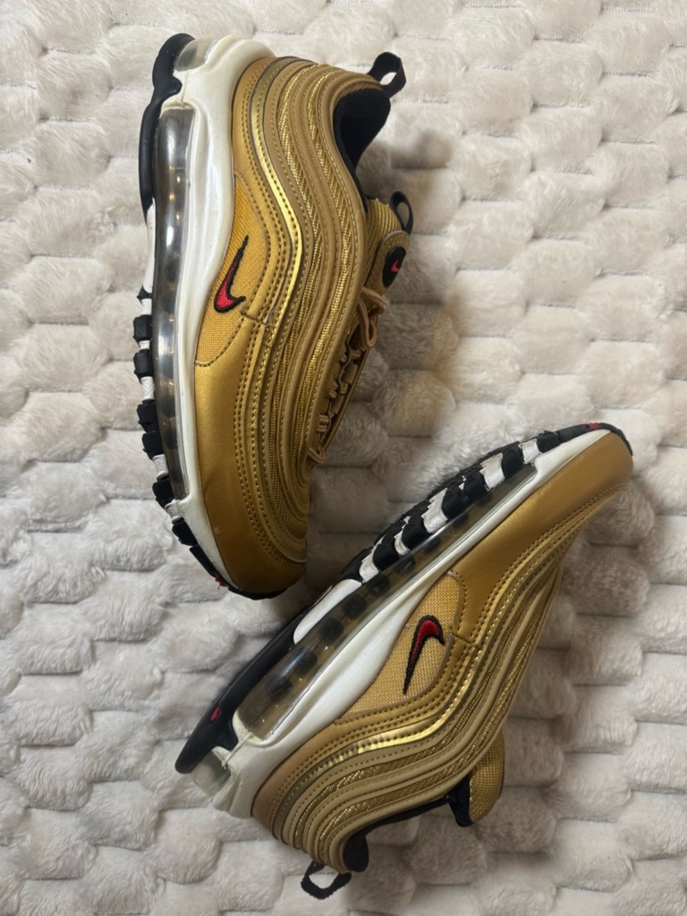 Nike Women’s Air Max 97 in Metallic Gold with Black and Red Swoosh